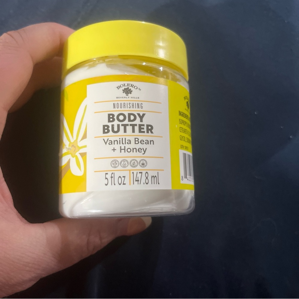 Yellow and White Body Moisturizer with Botanical Design